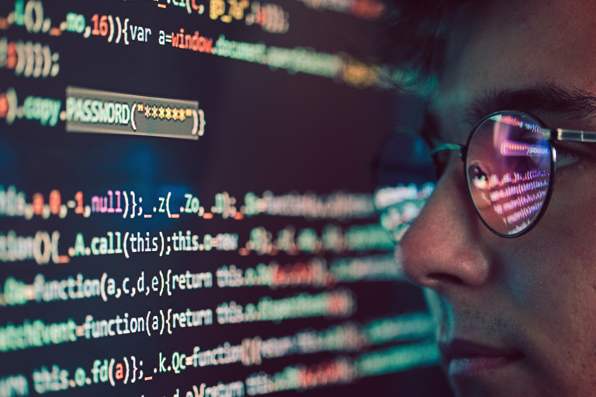 Hacker using computer, smartphone and coding to steal password and private data. Screen with code