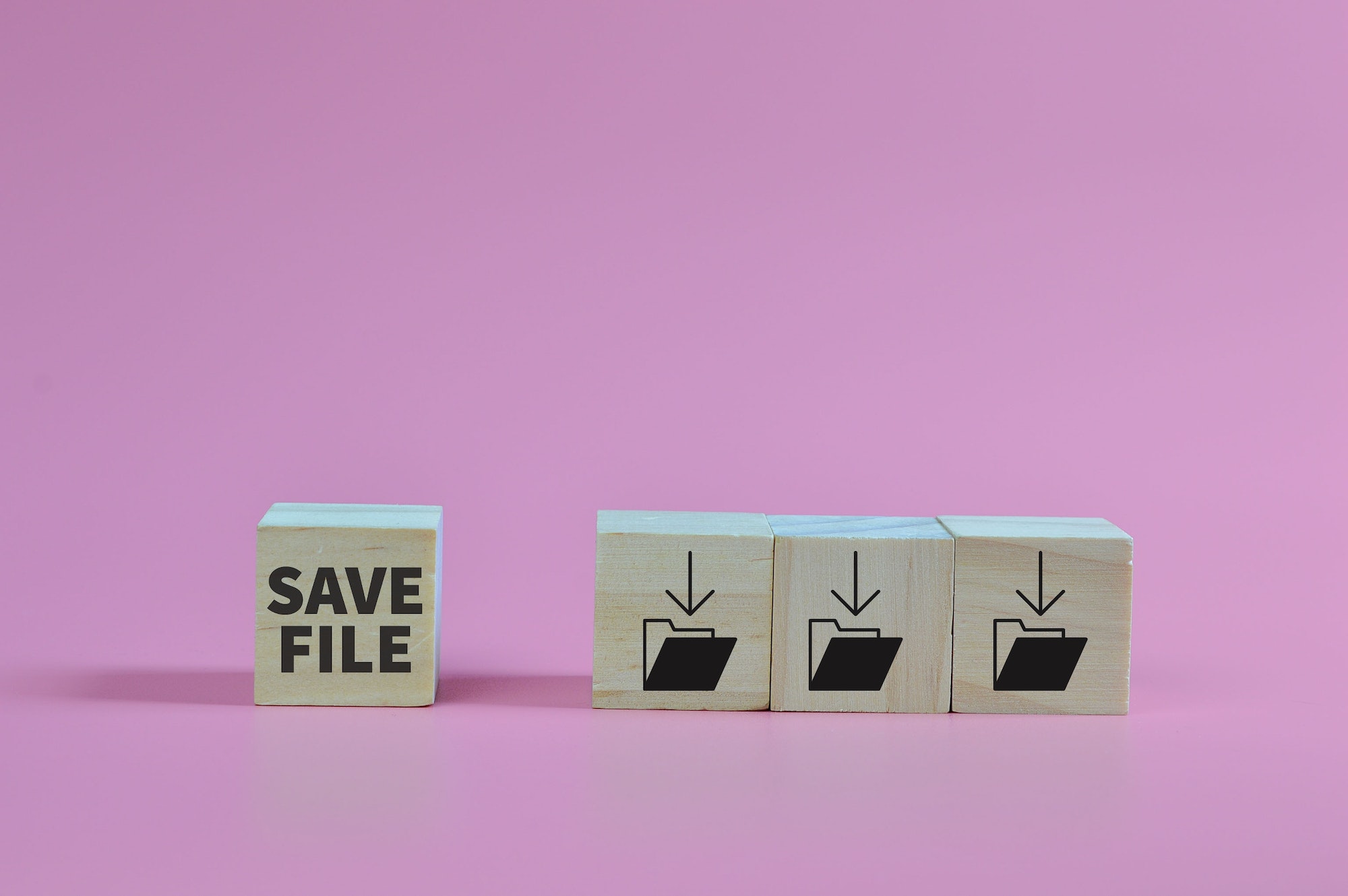 Wooden block with save file or save folder symbols